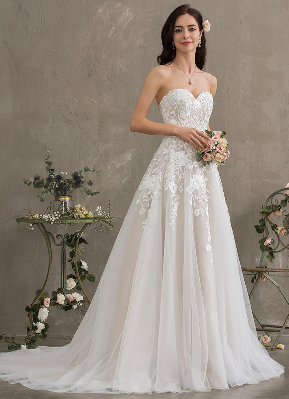 Robe Chic Blanc Élégant Avec Traîne